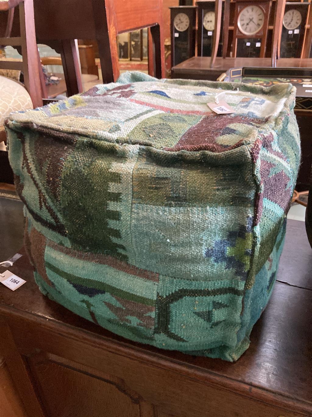 A square Kelim covered footstool, width 42cm, depth 42cm, height 40cm